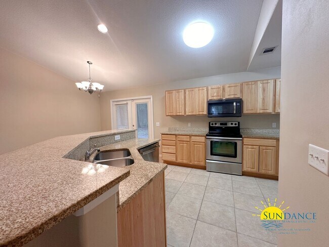 Building Photo - Gorgeous 3-Bedroom Home in Tranquil Navarre Neighborhood!