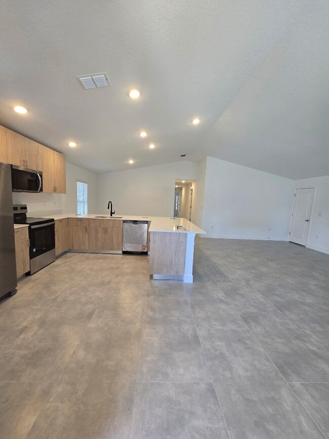Building Photo - Brand-New 4-Bed Beauty with Attached Garage in Palm Bay – Modern Comfort, Prime Convenience!