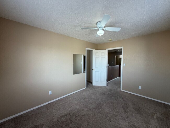 Building Photo - 4 Bedroom Home Available Near McMahon Blvd NW & Universe Blvd NW!