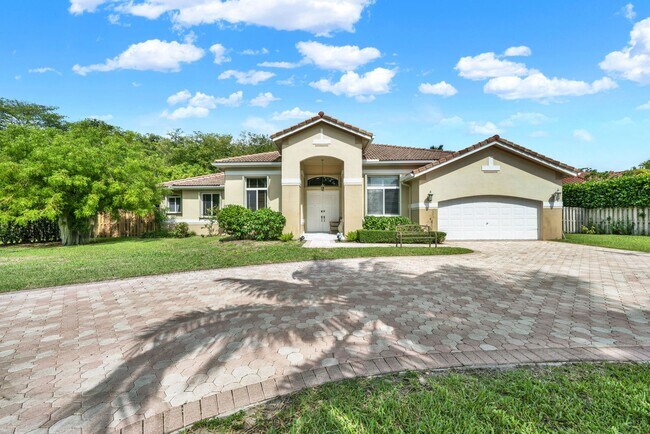 Primary Photo - Elegant 4-Bedroom Pool Home in Exclusive G...