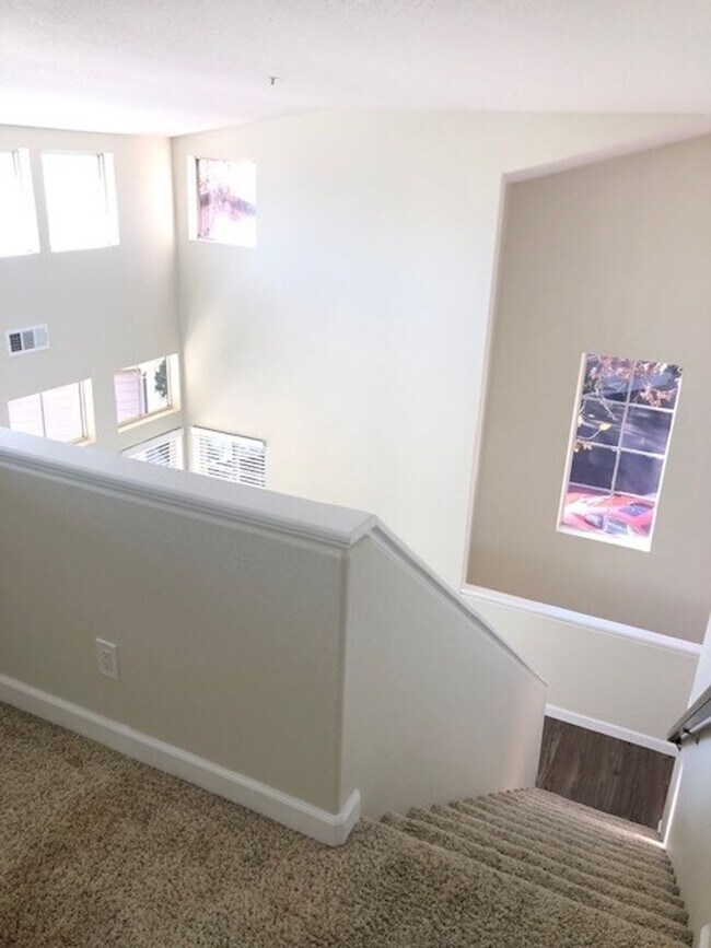 Building Photo - PICTURE PERFECT 2 BR/2 BATH PLUS LOFT END UNIT CONDO WITH DIRECT ACCESS 2 CAR GARAGE