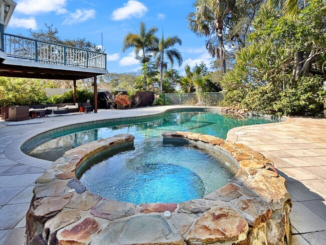 Building Photo - 4 Bed Waterfront Paradise with Pool, Dock & Gulf Access in Baileys Bluff