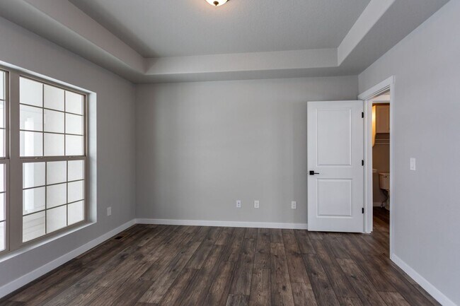 Building Photo - Exceptional 4-Bedroom Home with Dual Fireplaces, Main Level Master Suite, and Spacious Basement -...