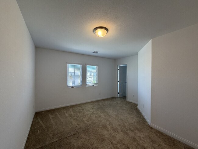 Building Photo - 7869 Tyrell Peaks St