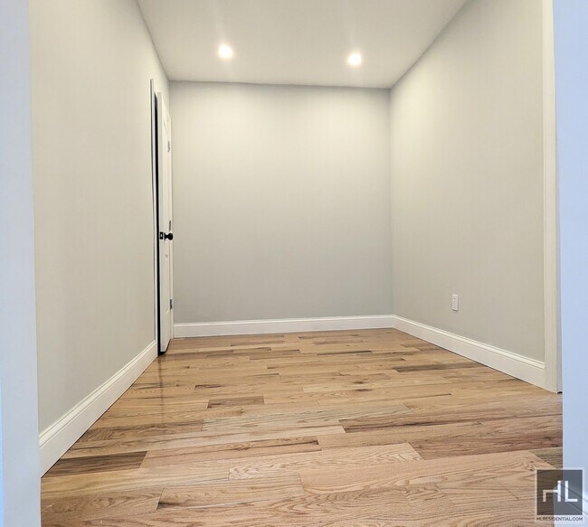 Building Photo - Beautiful Renovated Jackson Heights apartment