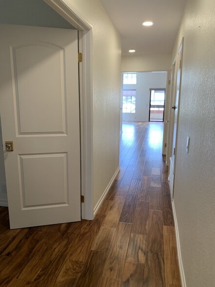 Master bedroom #2 double doors and hallway facing north - 2601 S Broadmoor Dr