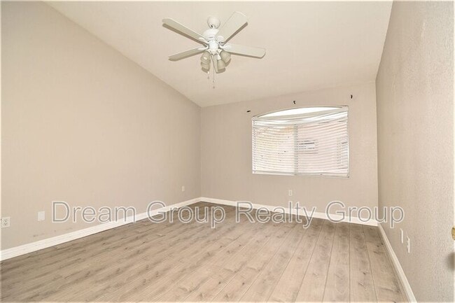 Building Photo - 5415 W Harmon Ave