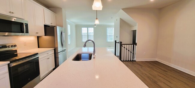 Building Photo - Brand new 3 story Townhome in Centerpointe...