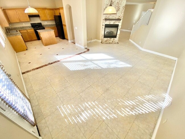 Building Photo - THIS SPACIOUS RESIDENCE FEATURES 4 BEDROOM...