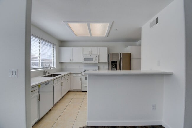 Building Photo - Beautiful 2 BR In Gated 89052 Community