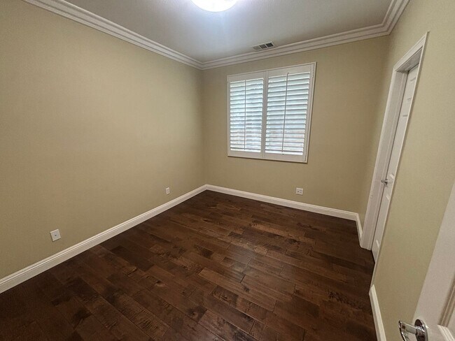 Building Photo - Spacious 4-Bedroom Home with Community Ame...