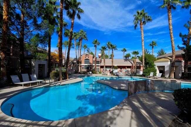Building Photo - FANTASTIC HIGHLY UPGRADED UNIT FACING THE PARK AND POOL.