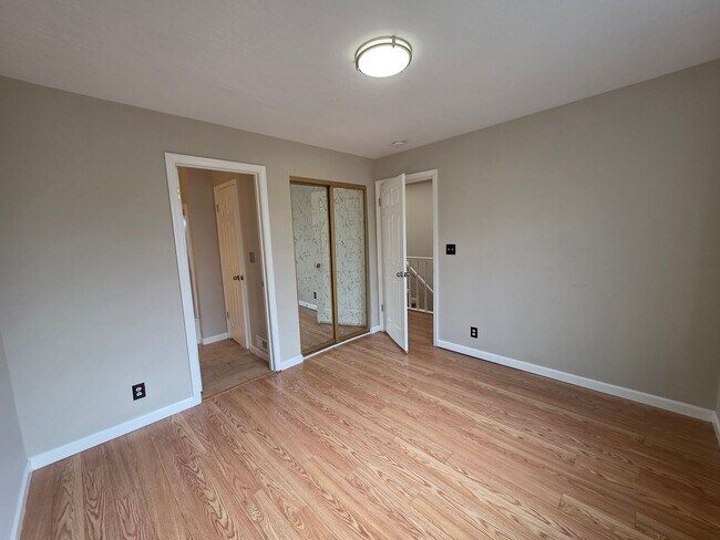 Building Photo - Spacious 2BR Condo with Central A/C, Bonus Room & Huge Storage – Walk to Burlingame Avenue