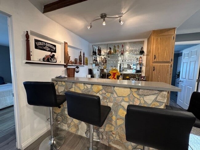 Building Photo - 3 BR 2 bath Furnished home Utilities Included & Brand new Interior-Custom Remodel