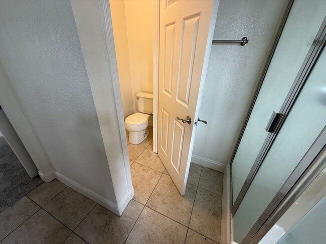 Building Photo - Gated 3BR|2.5BA|1508SF|2 Car Garage| Tenant pays $175 for WS&G | Community Pool, Clubhouse, & Fis...