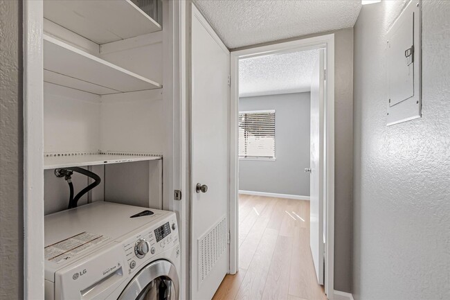 Building Photo - Stylish End-Unit Condo l Private Patio l C...