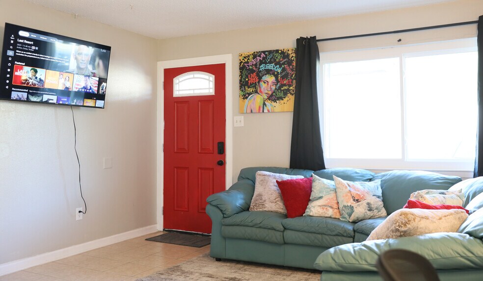 TV tilts, swivels and turns for your desired viewing angle. - 8612 Echo St