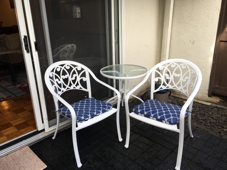 Patio with furniture. - 1720 Halford Ave