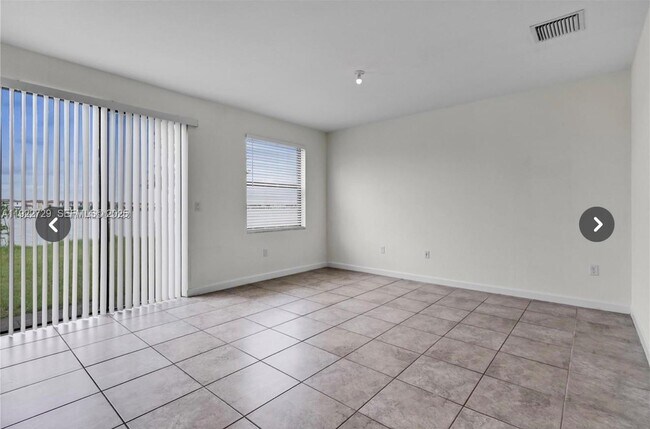 Building Photo - 10091 W 35th Ln