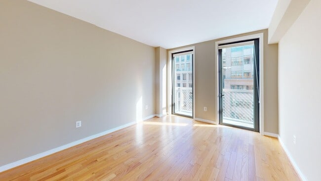 Building Photo - Penn Quarter Spacious One Bedroom W/Private Balcony ALL Amenity Building In Heart of DC!