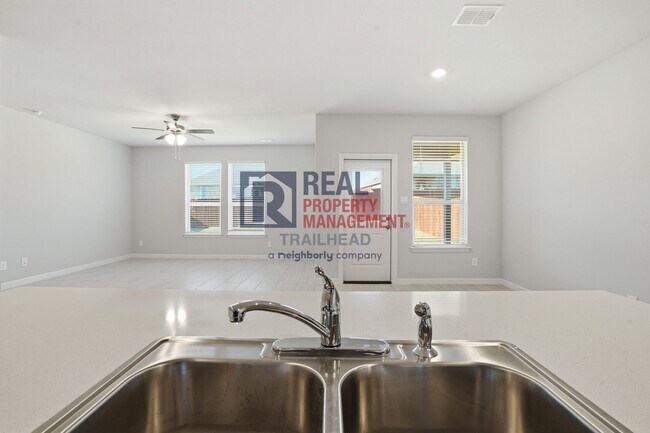 Building Photo - Inviting 4-Bedroom Layout with Flexible Living Areas