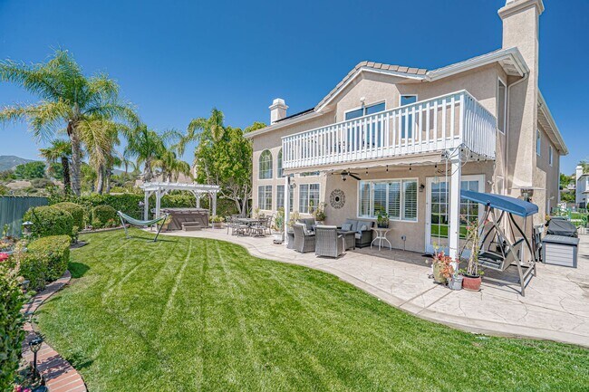 Building Photo - Expansive 5-Bedroom Home with Spa & Solar ...