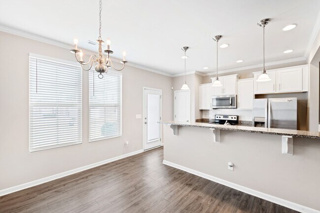 Building Photo - Modern Elegance in Brightleaf: 3-Bedroom Townhouse with Amenities Galore