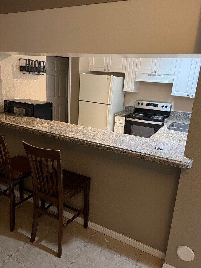 Kitchen granite countertop - 6832 W Sample Rd