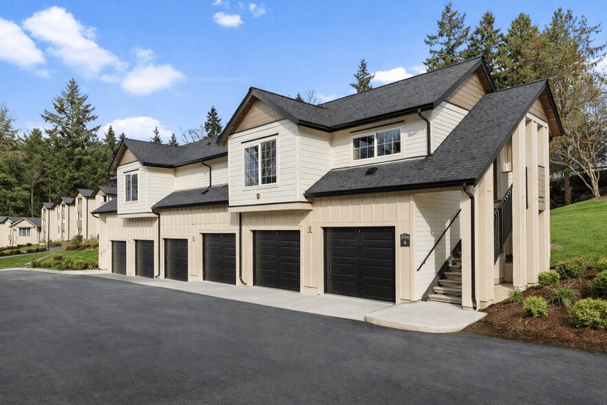 Modern Carriage-style Studio Apartment Building with Private Garages. - Boardwalk at University Place