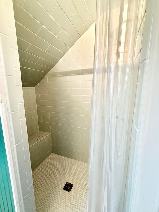 Building Photo - All Inclusive West End Condo-Fully Furnished with Parking!