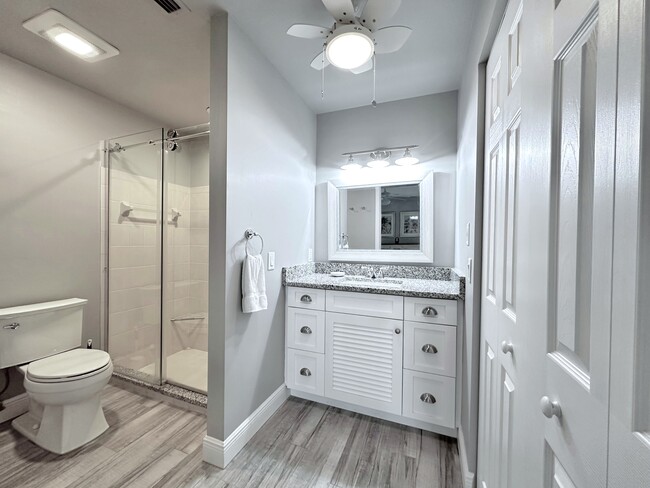 Main Bathroom - 7723 SE Sugar Sand Cir