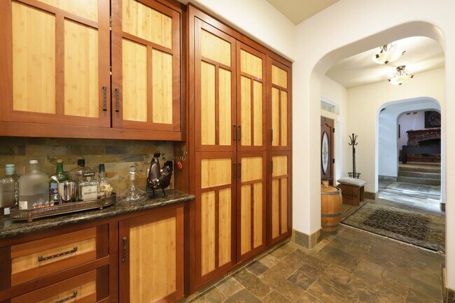 Building Photo - Don't miss this amazing opportunity to rent a higher end home nestled in the trees in the coveted...