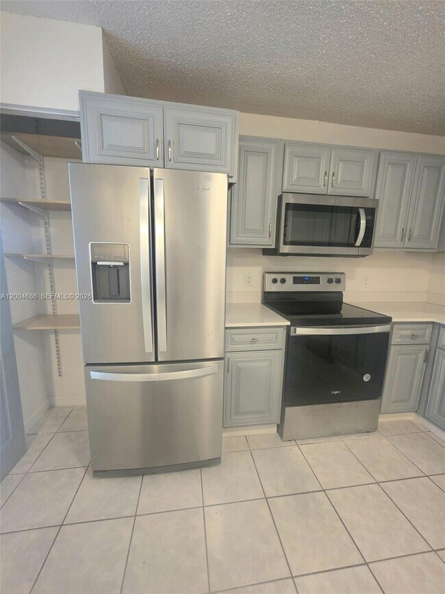 Building Photo - 8958 W Sample Rd