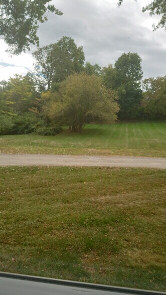 Living Room window nature view - 7 Callahan Dr