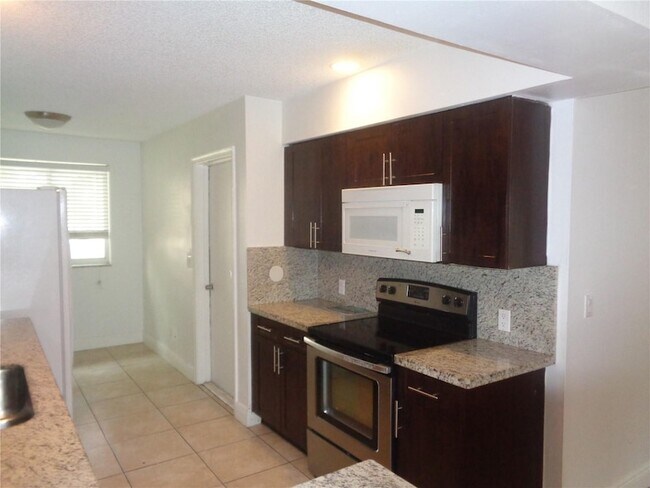Building Photo - 10939 W Broward Blvd