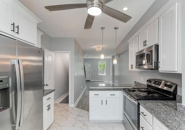 Building Photo - Stylish, Renovated Home Near Downtown Baltimore! W/D! Central Air! Close to Johns Hopkins Main Ca...