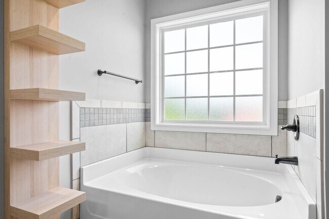 Building Photo - Pet Friendly Three Bedroom with Bonus!