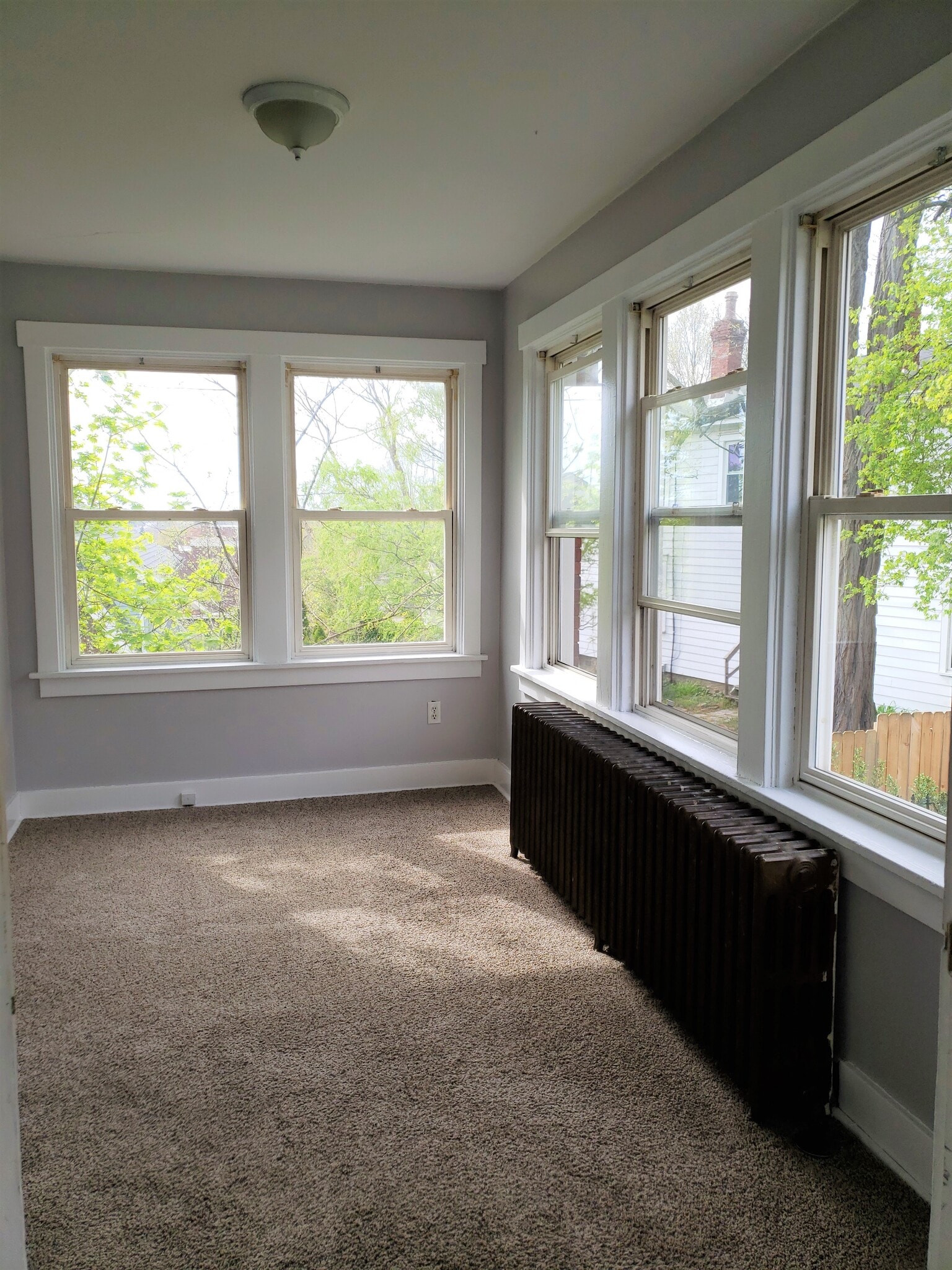 Enter the home to a welcoming sun room/mud room - 201 Richbarn Rd