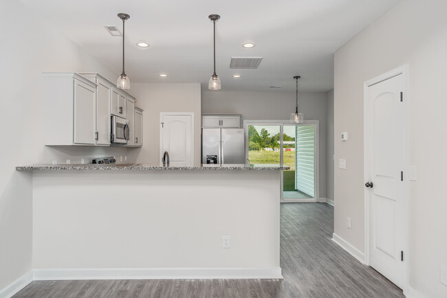 open design from living area to kitchen - 70 Catalina Cir