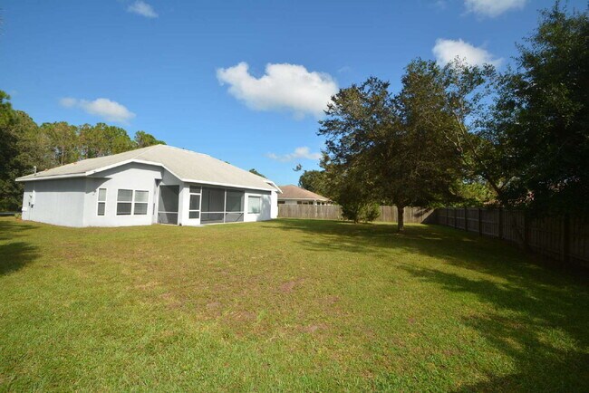 Building Photo - "Charming 3-Bed Oasis in Palm Coast - 1,85...