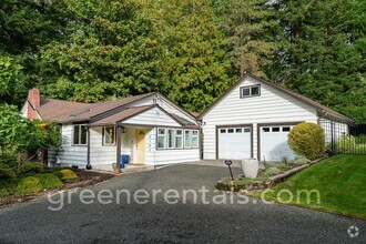 Building Photo - Charming 2BR 2BA Home Off Cooper Point Rd