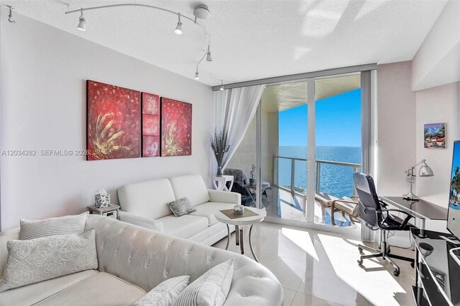 Building Photo - 16699 Collins Ave