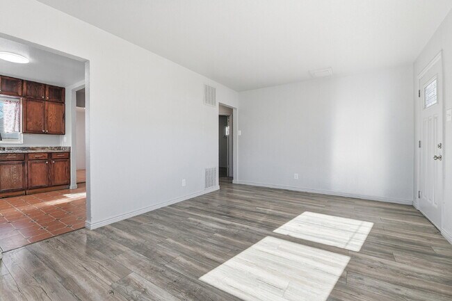 Building Photo - $1,930.95 - 3 Bedrooms, 1 Bathroom, Single Family Home in Aurora with fenced Yard!