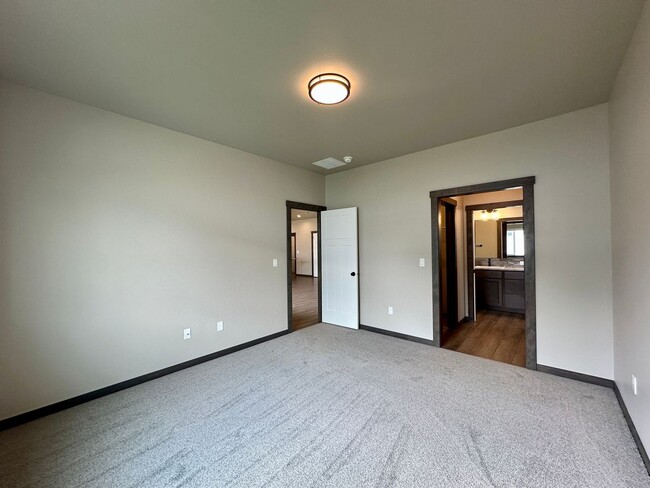 Building Photo - New Build Ranch Style Home Available with RV or Boat Garage!!