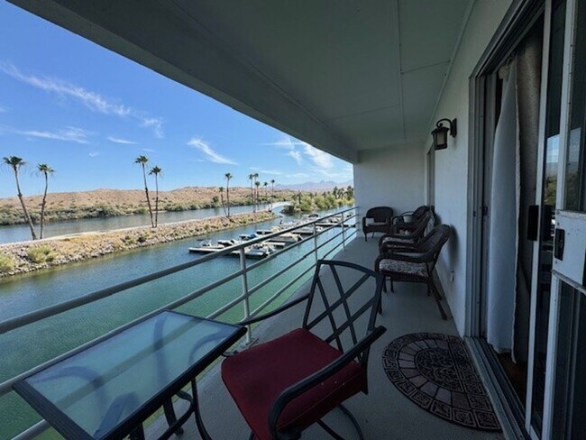 Building Photo - 2BR 2BA Furnished Vacation Condo Waterfron...