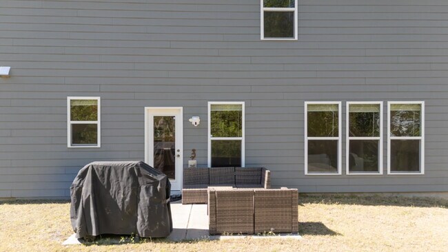 Building Photo - "Discover Spacious Living: 5-Bedroom Craftsman Home in Gated and Amenity-Rich Bretagne with Top-R...