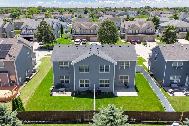 Building Photo - Spacious 4-Bedroom, 3.5-Bathroom Townhome & 2-Car Garage-West Champaign