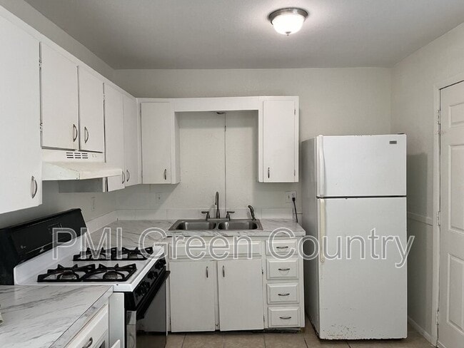 Building Photo - 1412 S 73rd E Ave