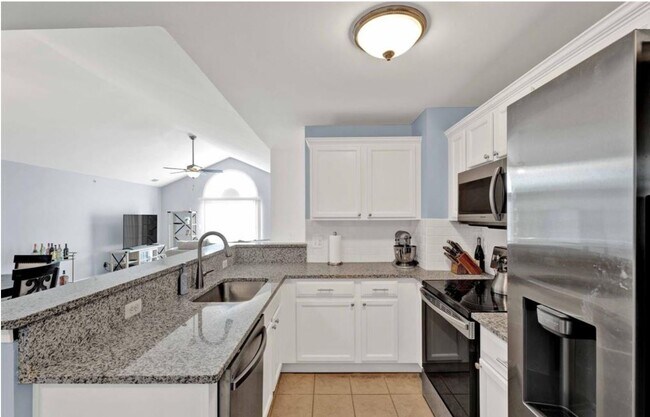 Building Photo - 7869 Ambassador Dr