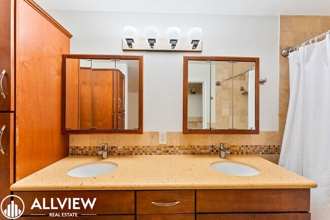 Building Photo - Fully Furnished Condo (2 Bed/2 Bath + Den) Nestled in the Coveted Newport Heights Community!